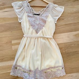 Cream dress with pink lace detail